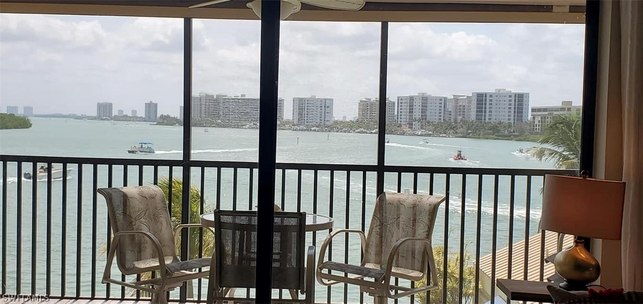 400 Lenell Road, Unit 207 Fort Myers Beach, FL 33931 - Photo 9 of 16 a view of a balcony with yard