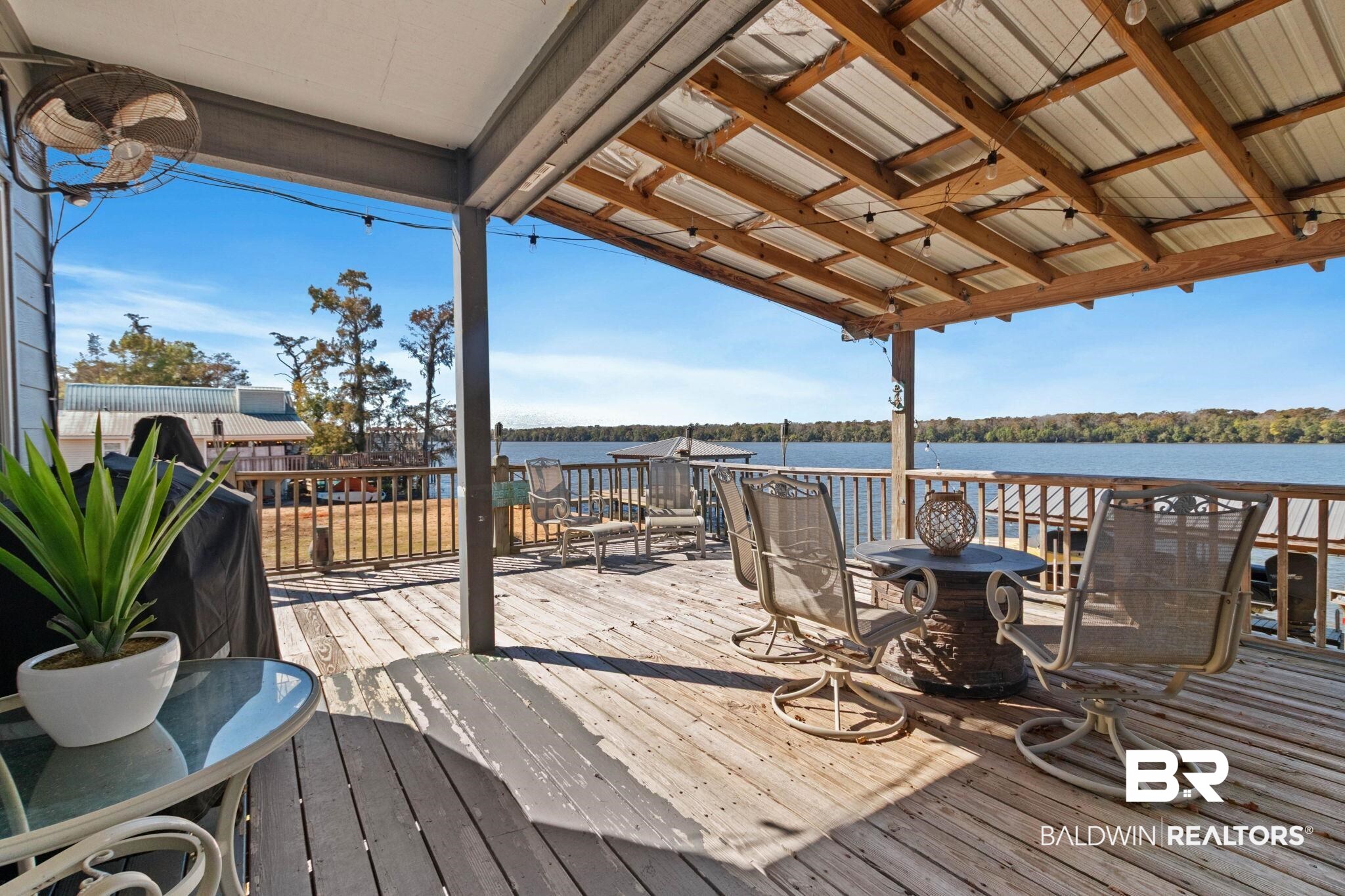 41997 Bayou Road Bay Minette, AL 36507 - Photo 48 of 68 Wooden terrace with a water view and outdoor dining area