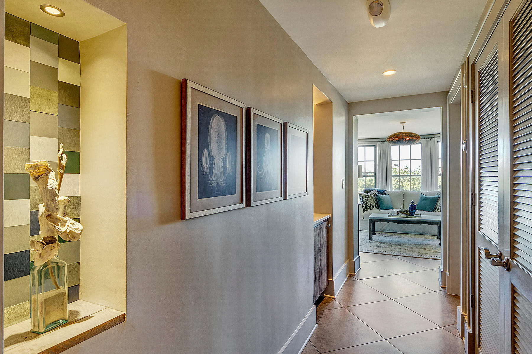 5 Main Street, Unit 1D Rosemary Beach, FL 32461 - Photo 14 of 29 a view of a hallway with bathroom and glass door shower