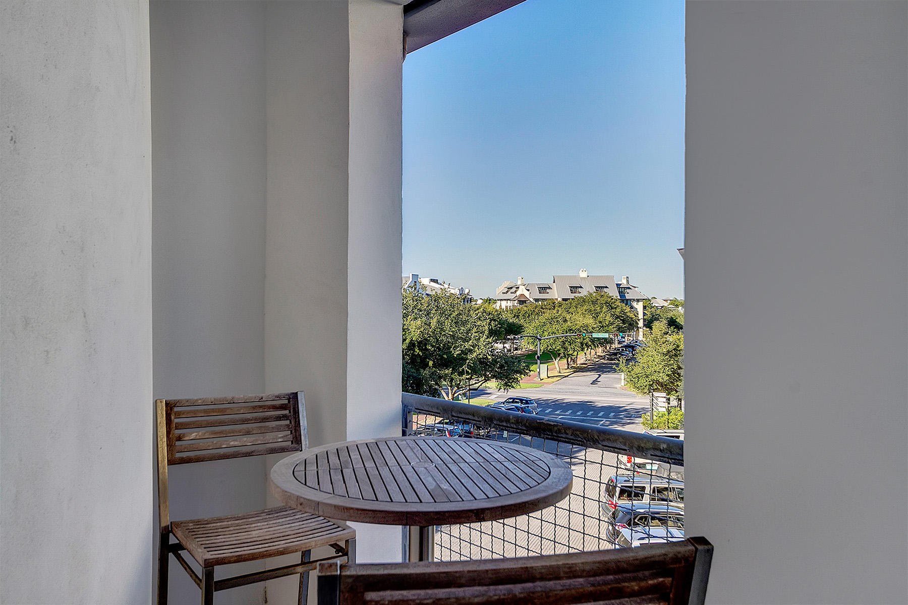 5 Main Street, Unit 1D Rosemary Beach, FL 32461 - Photo 27 of 29 a view of porch with a table and chair