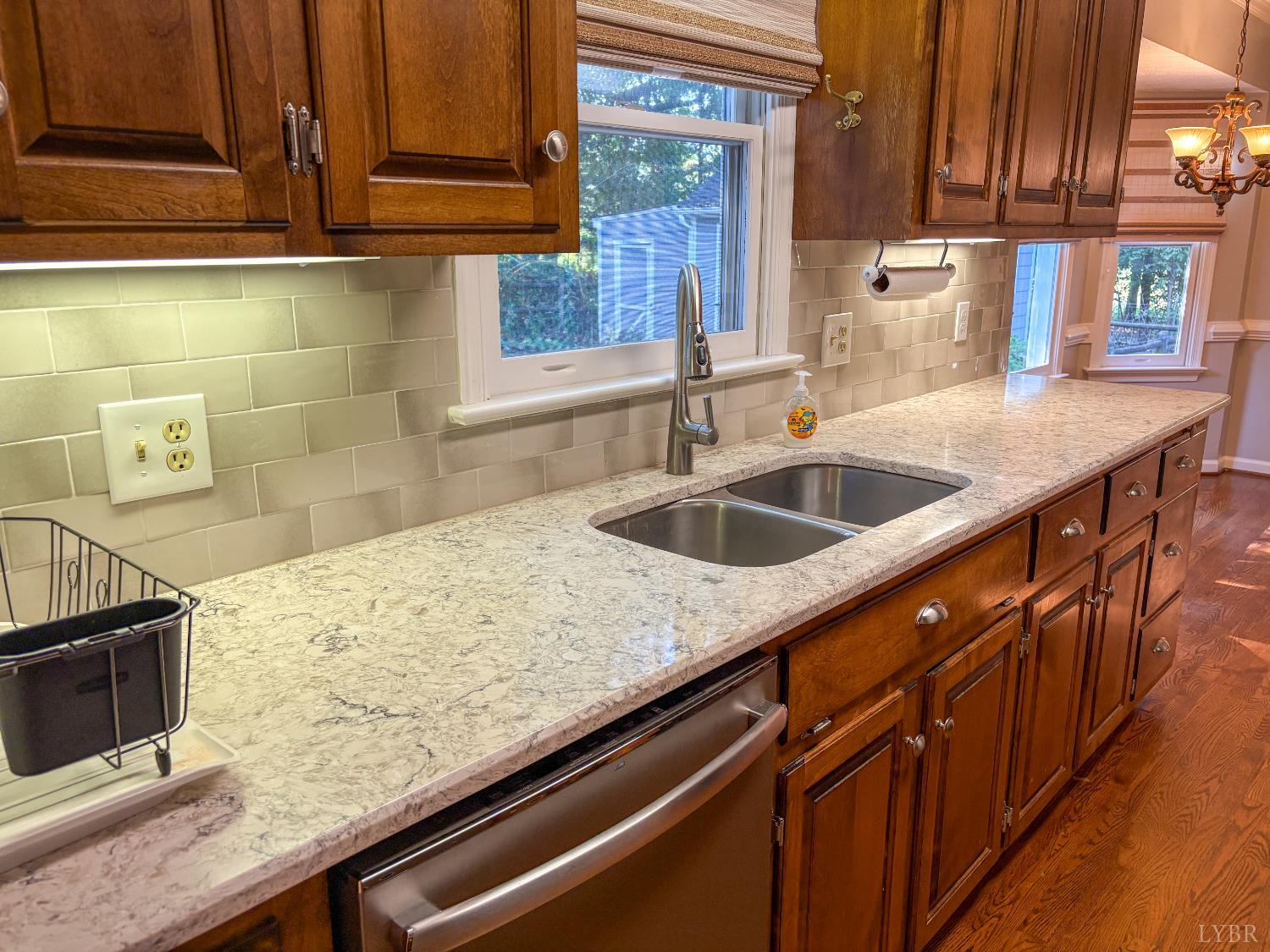 202 Hounds Run Forest, VA 24551 - Photo 12 of 38 a kitchen with granite countertop stainless steel appliances sink and cabinets