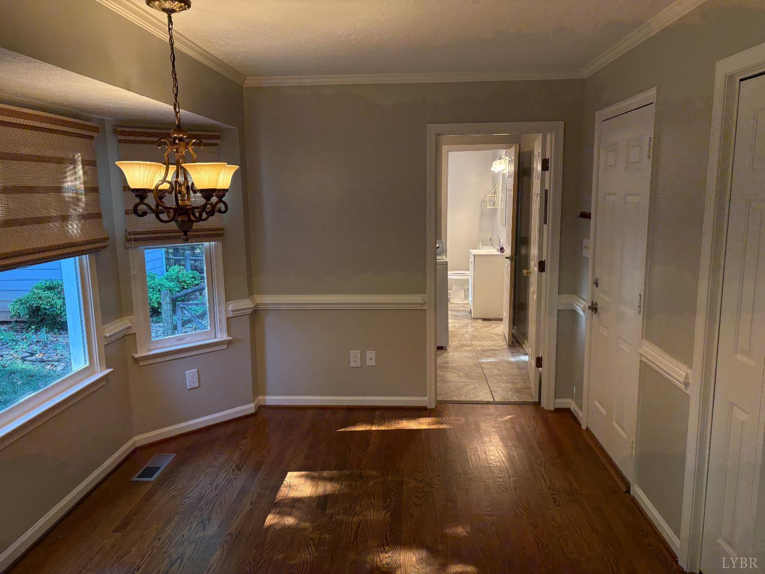 202 Hounds Run Forest, VA 24551 - Photo 15 of 38 a view of room with window and wooden floor