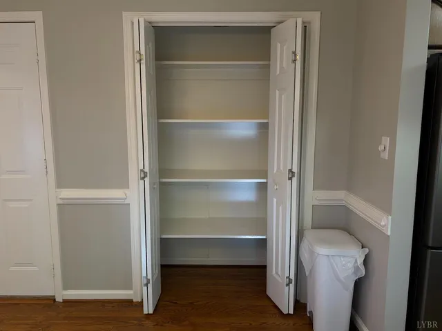 a bathroom with a sink a mirror and a shower