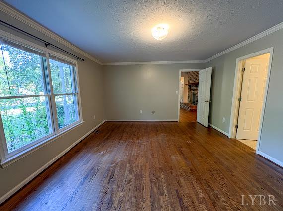 202 Hounds Run Forest, VA 24551 - Photo 31 of 38 an empty room with wooden floor and windows