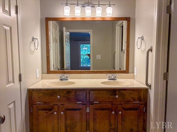 202 Hounds Run Forest, VA 24551 - Photo 33 of 38 a bathroom with a sink and a mirror