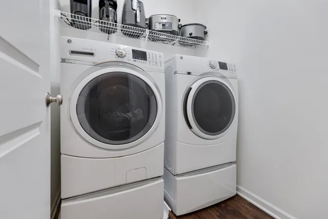 a utility room with dryer and washer