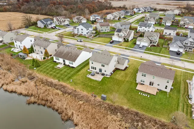 a view of swimming pool with a yard
