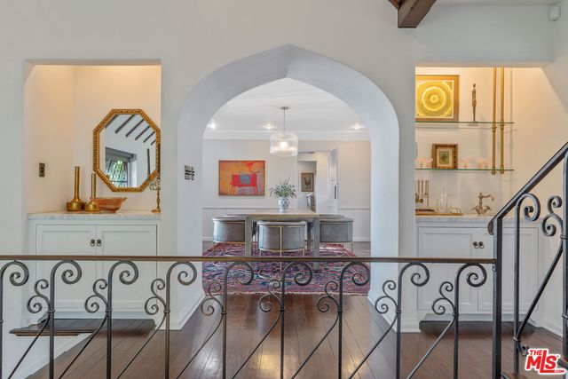 a living room with a furniture and a rug