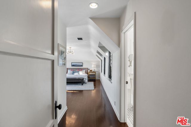 a bedroom with bed and window