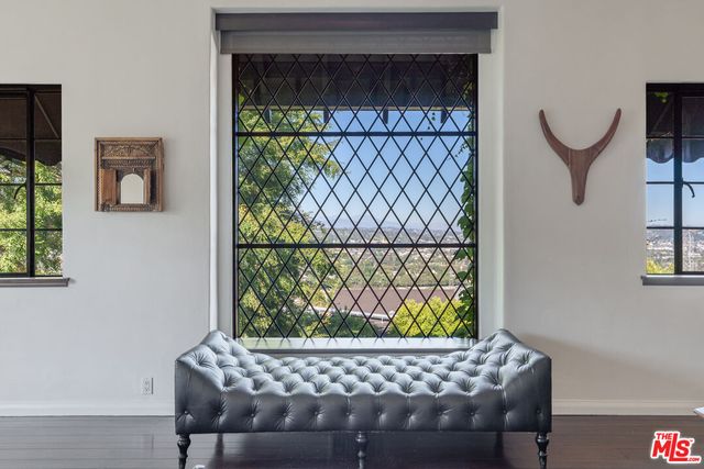 a bed room with a bed and a window