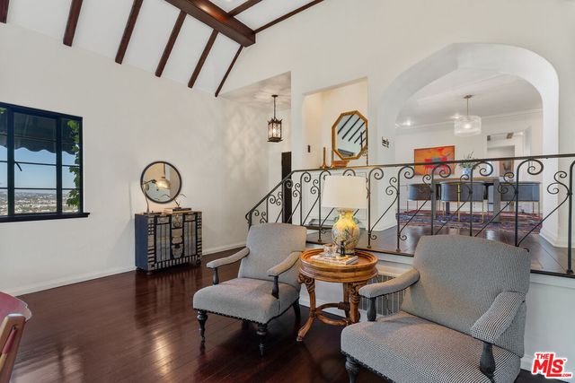 a view of a livingroom with furniture and wooden floor