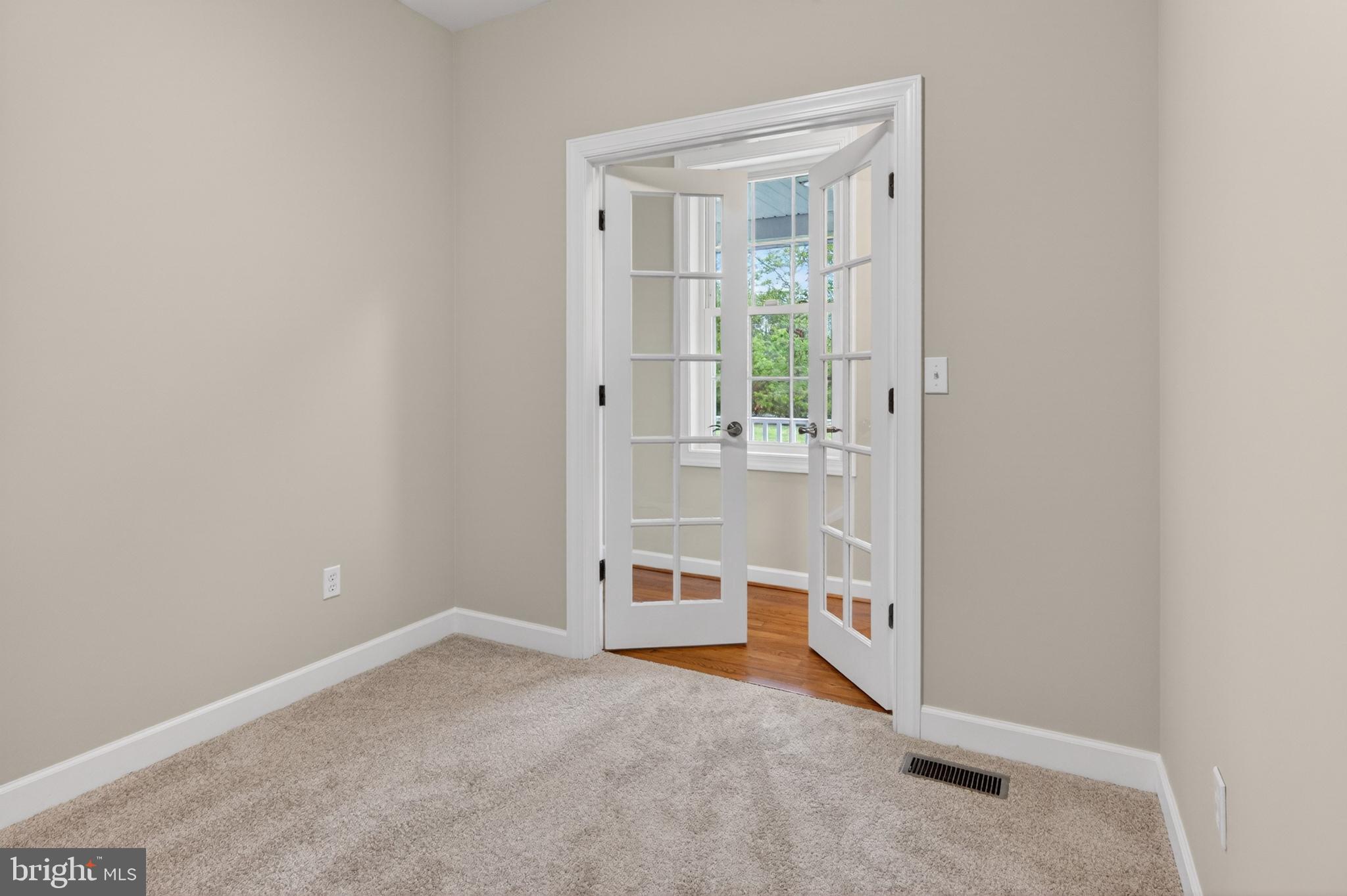 337 Roe Ingleside Road Centreville, MD 21617 - Photo 44 of 56 an empty room with windows