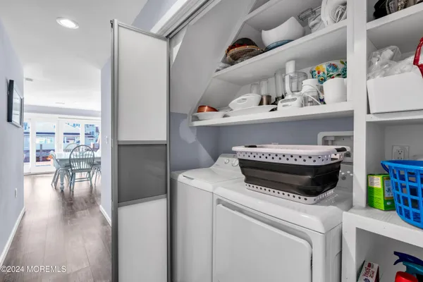 a kitchen with a stove and a refrigerator