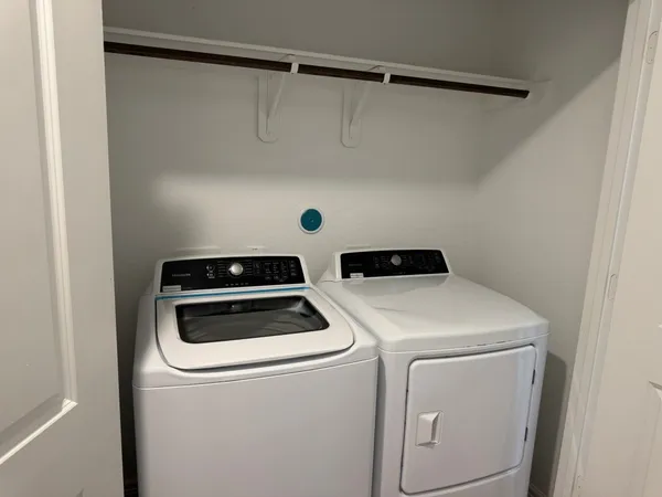 a close up view of washer and dryer