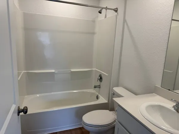 a bathroom with a sink and a toilet