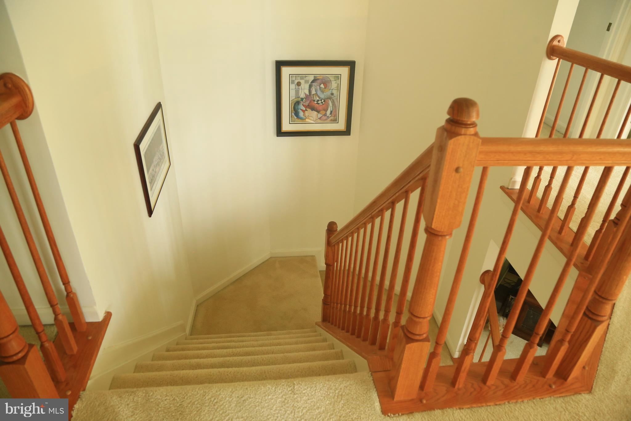 18303 Ashmeade Road Boyds, MD 20841 - Photo 12 of 23 Staircase connects Main & Upper Level