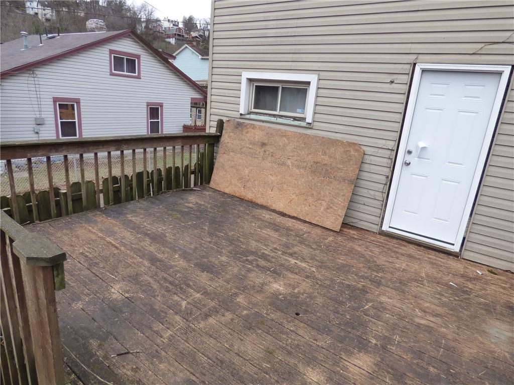 911 Amherst Street Pittsburgh, PA 15220 - Photo 6 of 36 a view of a house with wooden fence