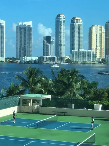 a view of a city with tall buildings