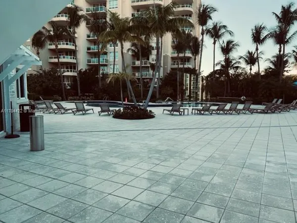 a view of a chairs and table in a terrace