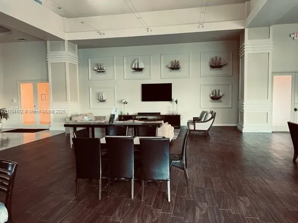 swimming pool view with a lake view