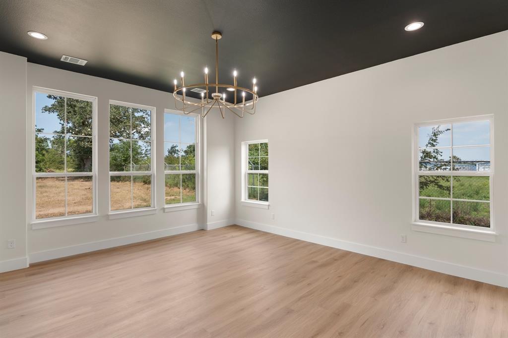 320 Dalton Road Canton, TX 75103 - Photo 12 of 29 Primary bedroom wood-type flooring, plenty of natural light, and recessed lighting