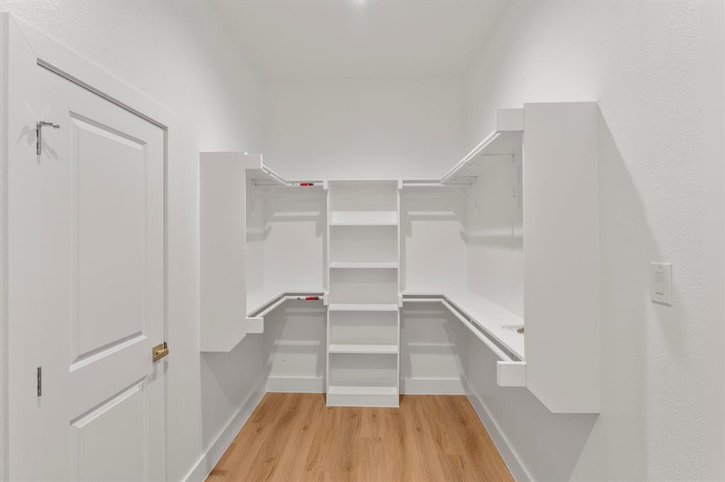 320 Dalton Road Canton, TX 75103 - Photo 15 of 29 Walk in closet featuring light wood-style flooring