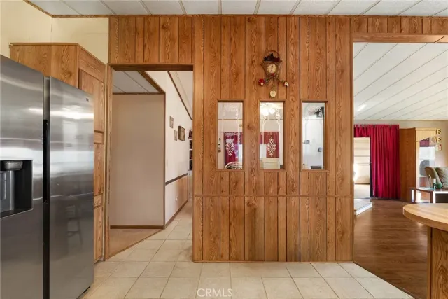a kitchen with a stove a sink and a microwave