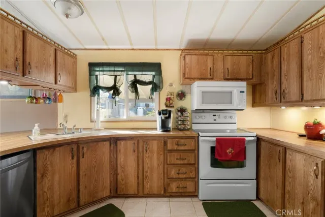 a bathroom with a sink a mirror and a shower