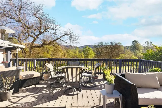 a view of a patio with couches chairs and a table and chairs