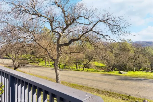 a view of a backyard with sitting area and furniture
