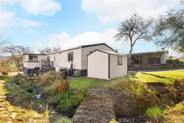 a backyard of a house with seating space