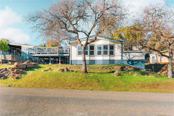 a view of a swimming pool with a yard