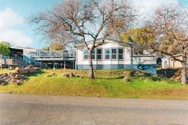 a view of a swimming pool with a yard
