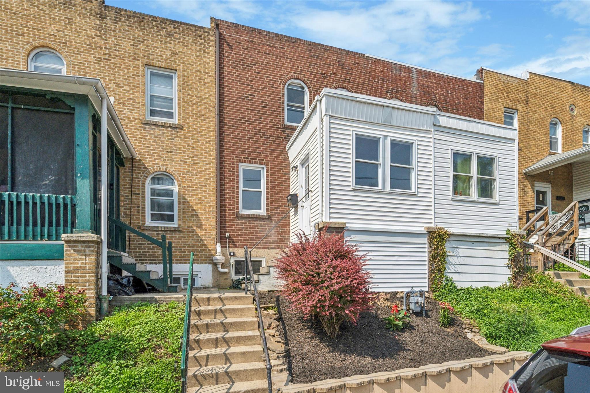 7139 Guilford Road Upper Darby, PA 19082 - Photo 2 of 14 a front view of a house with a yard
