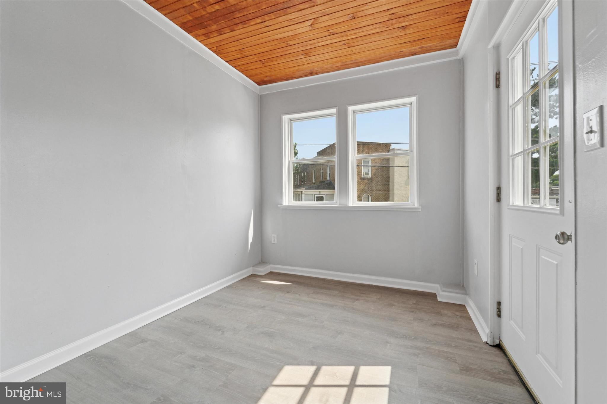 7139 Guilford Road Upper Darby, PA 19082 - Photo 3 of 14 an empty room with a window