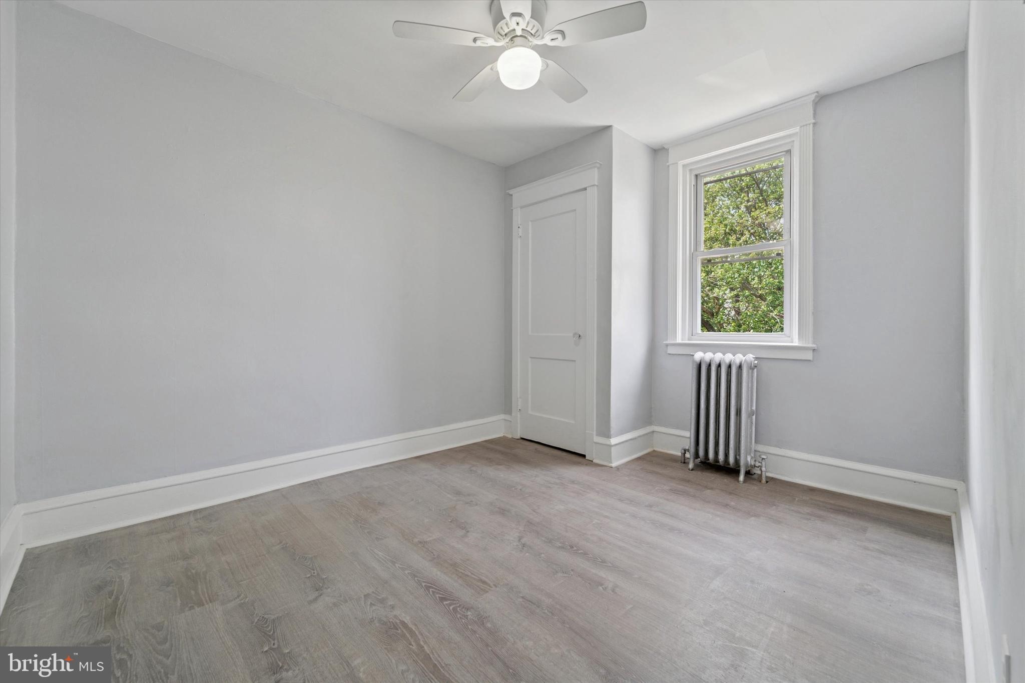 7139 Guilford Road Upper Darby, PA 19082 - Photo 10 of 14 an empty room with windows and closet