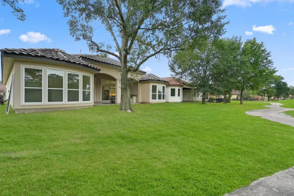 a house view with a garden space