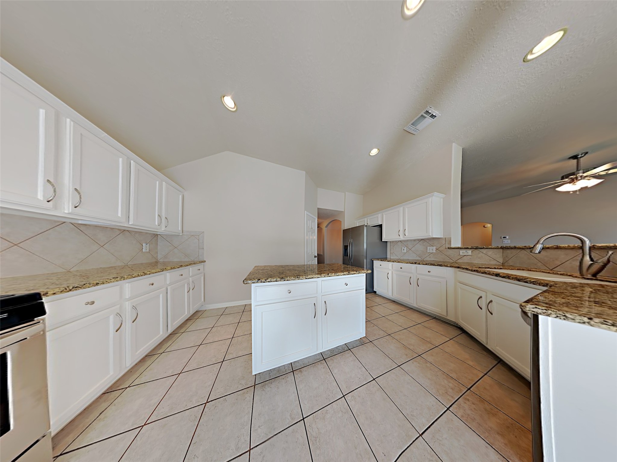 74 Wimberly Way Conroe, TX 77385 - Photo 12 of 18 a view of a kitchen with electric appliances