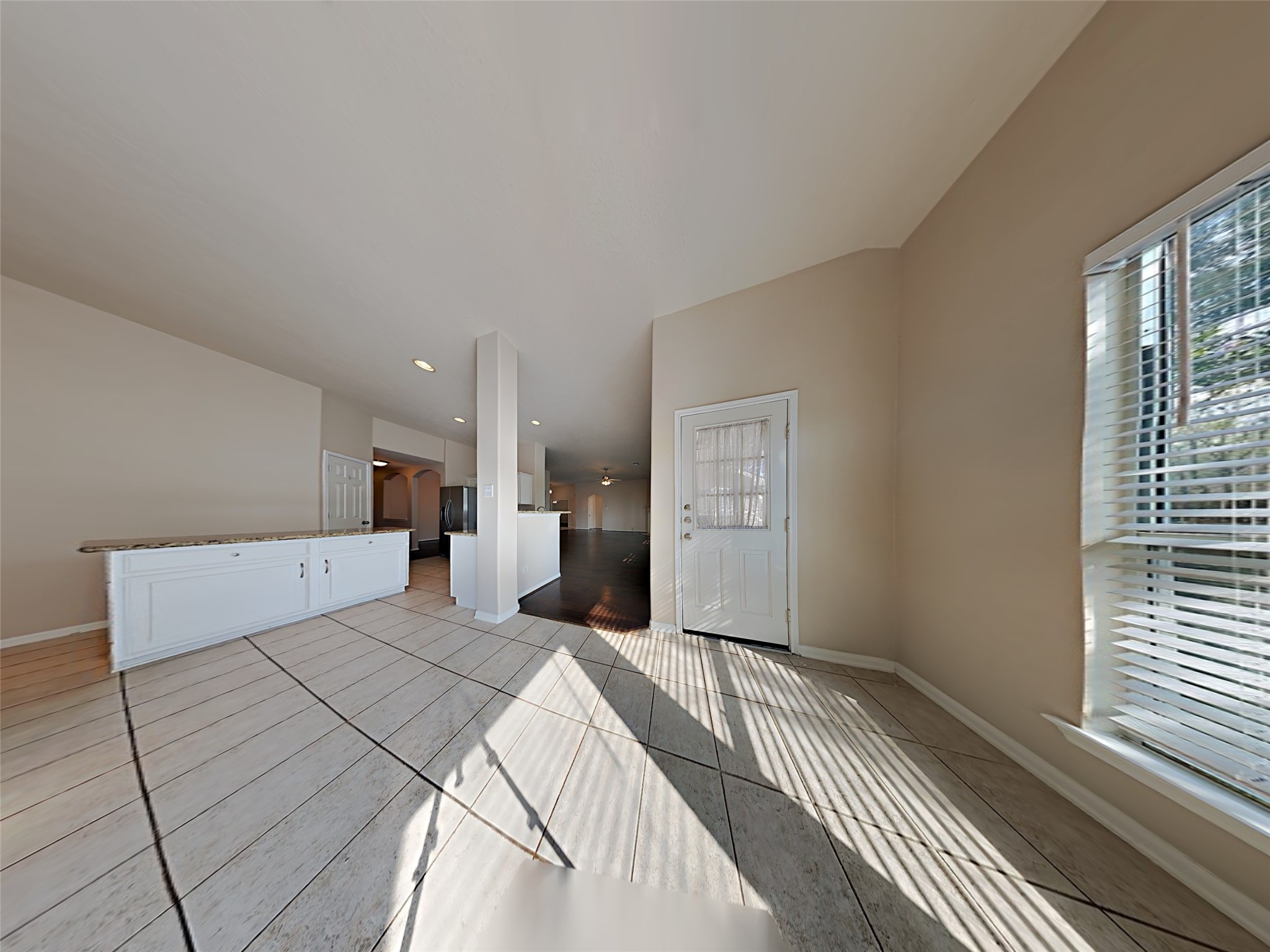 74 Wimberly Way Conroe, TX 77385 - Photo 13 of 18 a bedroom with a bed and a window