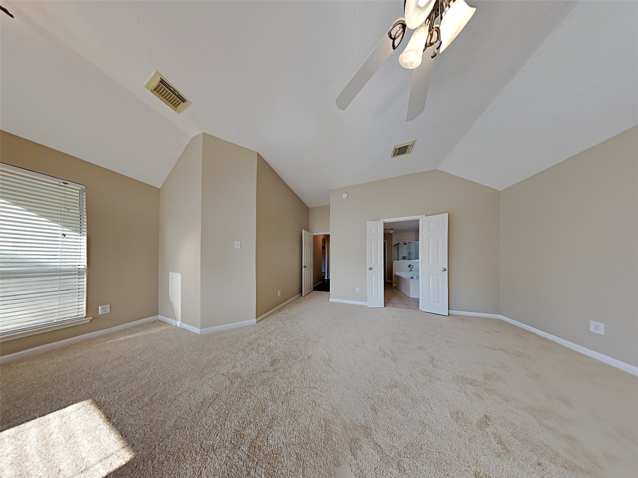 74 Wimberly Way Conroe, TX 77385 - Photo 15 of 18 a view of empty room with a ceiling fan