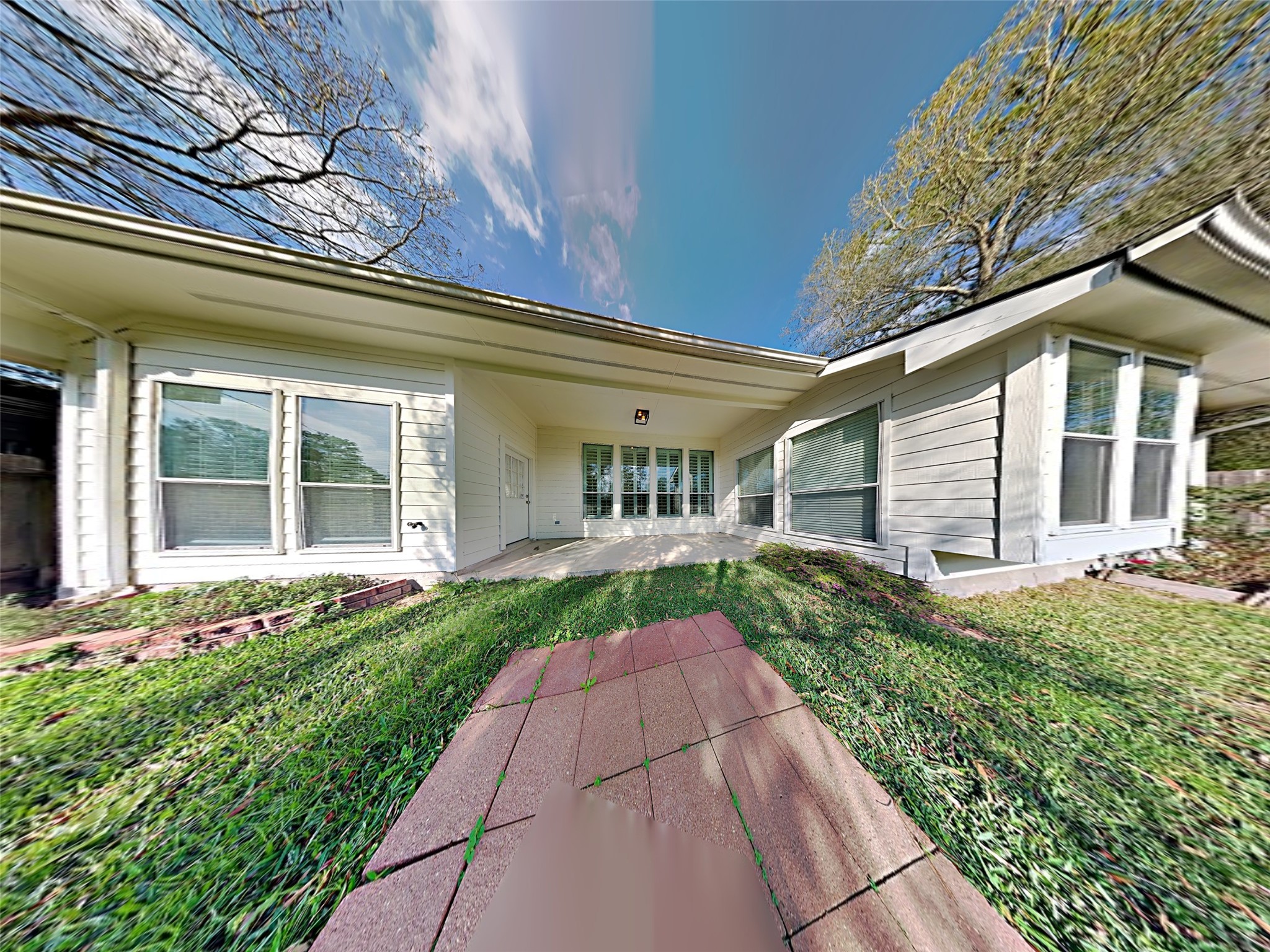 74 Wimberly Way Conroe, TX 77385 - Photo 18 of 18 a front view of a house with a yard and potted plants