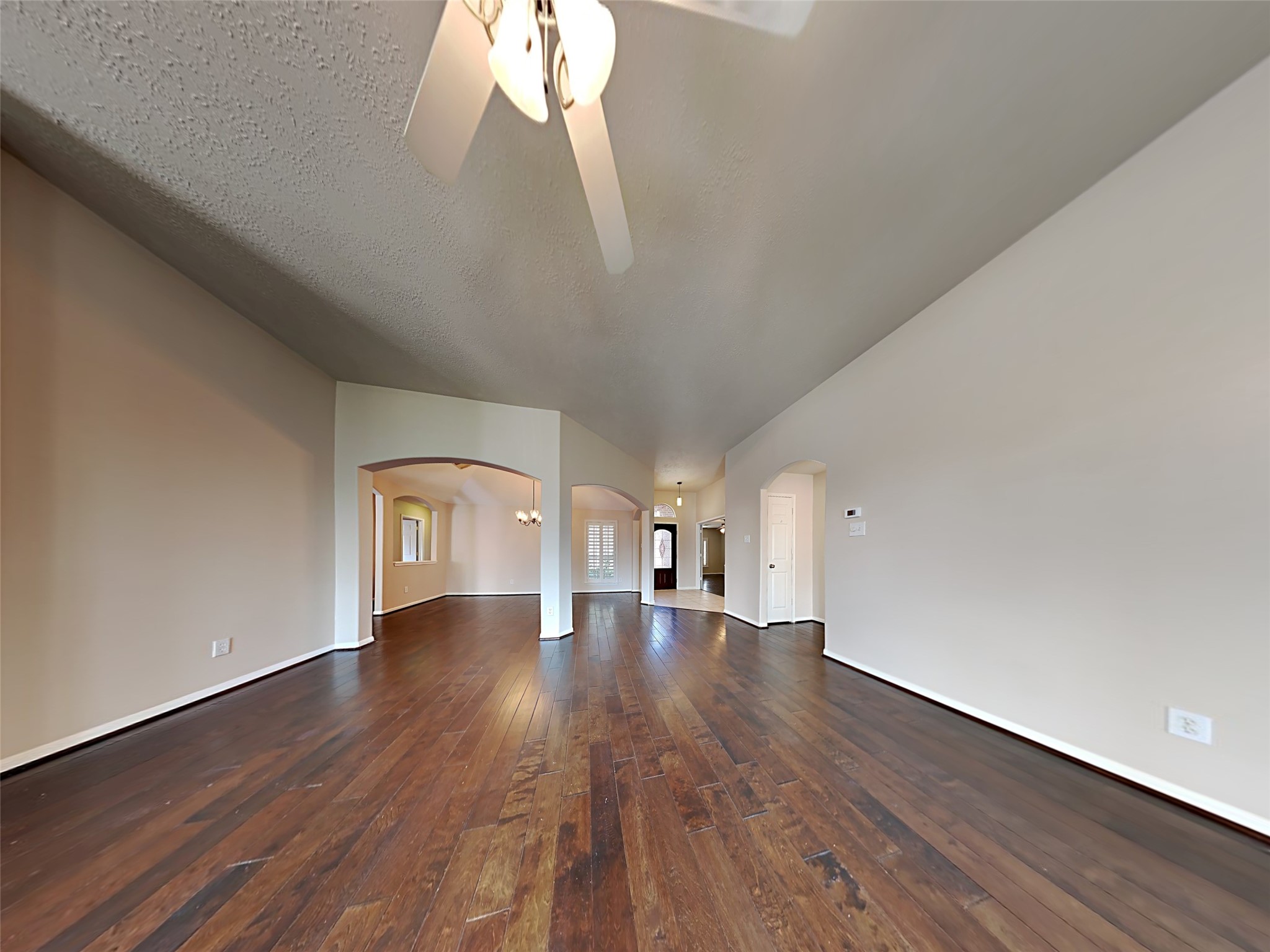 74 Wimberly Way Conroe, TX 77385 - Photo 10 of 18 a view of empty room with wooden floor