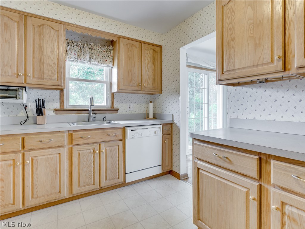1535 Chelmsford Road Cleveland, OH 44124 - Photo 8 of 19 Kitchen boasts beautiful wood cabinets, SS sink and plenty of counter space.