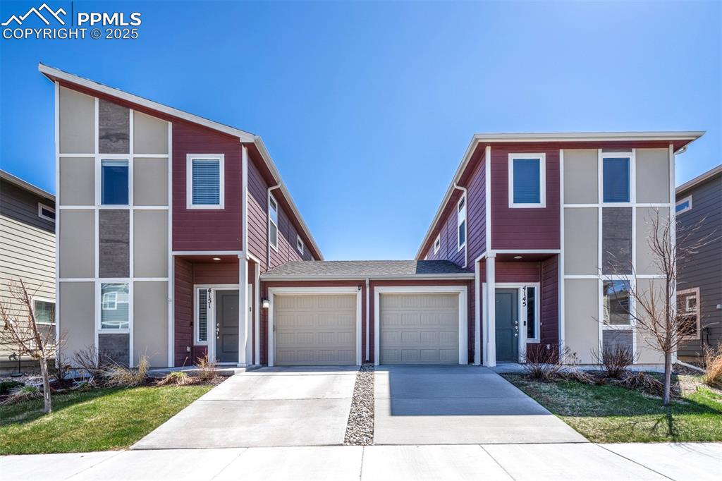 a front view of a house with yard