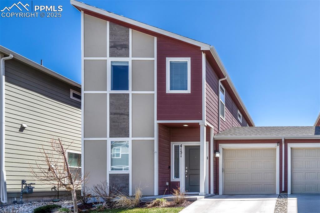 4151 Jericho Loop Colorado Springs, CO 80916 - Photo 2 of 34 a front view of a house