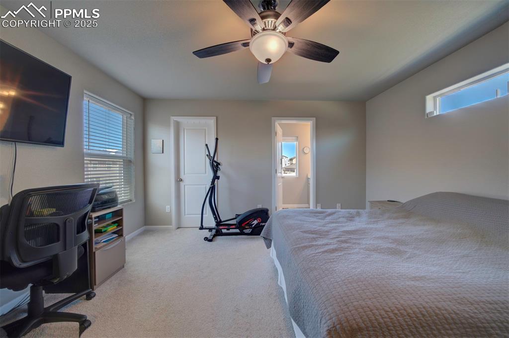 4151 Jericho Loop Colorado Springs, CO 80916 - Photo 24 of 34 a view of a room with gym equipment