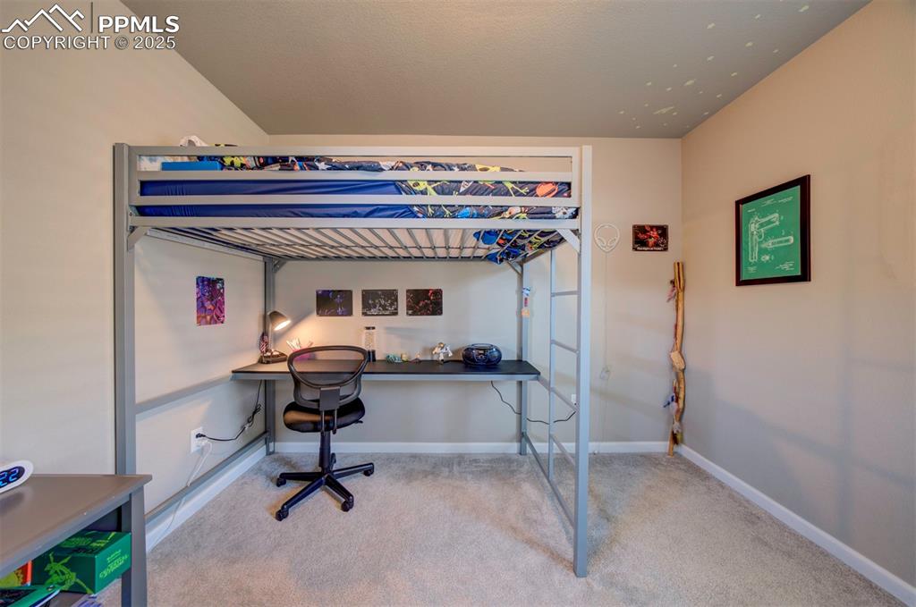 4151 Jericho Loop Colorado Springs, CO 80916 - Photo 27 of 34 a view of a workspace with furniture