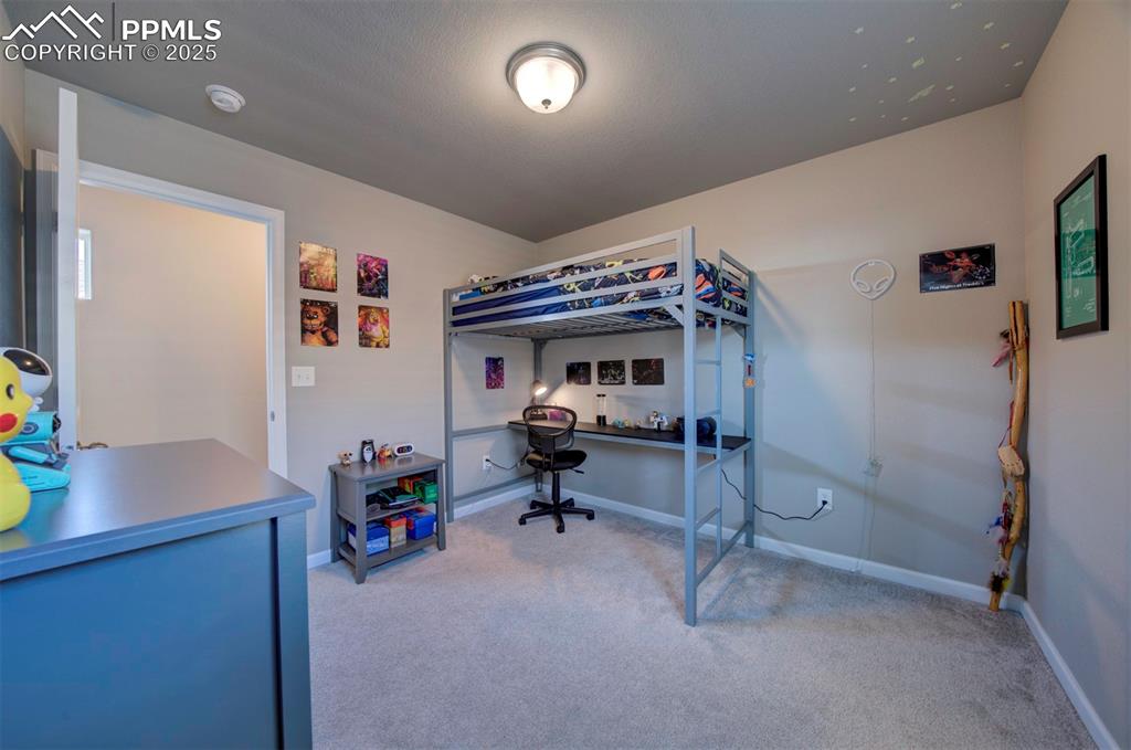 4151 Jericho Loop Colorado Springs, CO 80916 - Photo 28 of 34 a view of room with workspace and windows