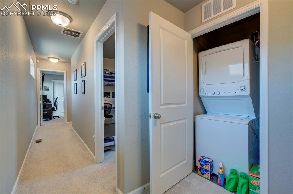 4151 Jericho Loop Colorado Springs, CO 80916 - Photo 32 of 34 a view of hallway with washer and dryer