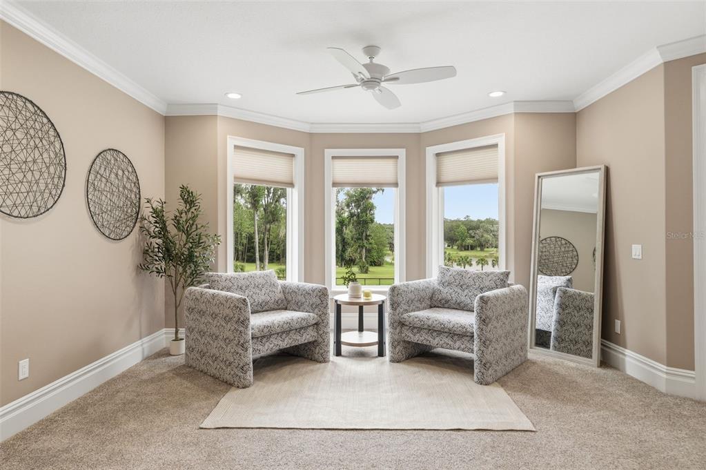 855 Southeast 87th Street Ocala, FL 34480 - Photo 34 of 79 a living room with furniture and a large window